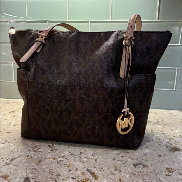 Michael Kors Handbags - Michael Kors Brown and Tan MK Signature Tote with Gold Charm